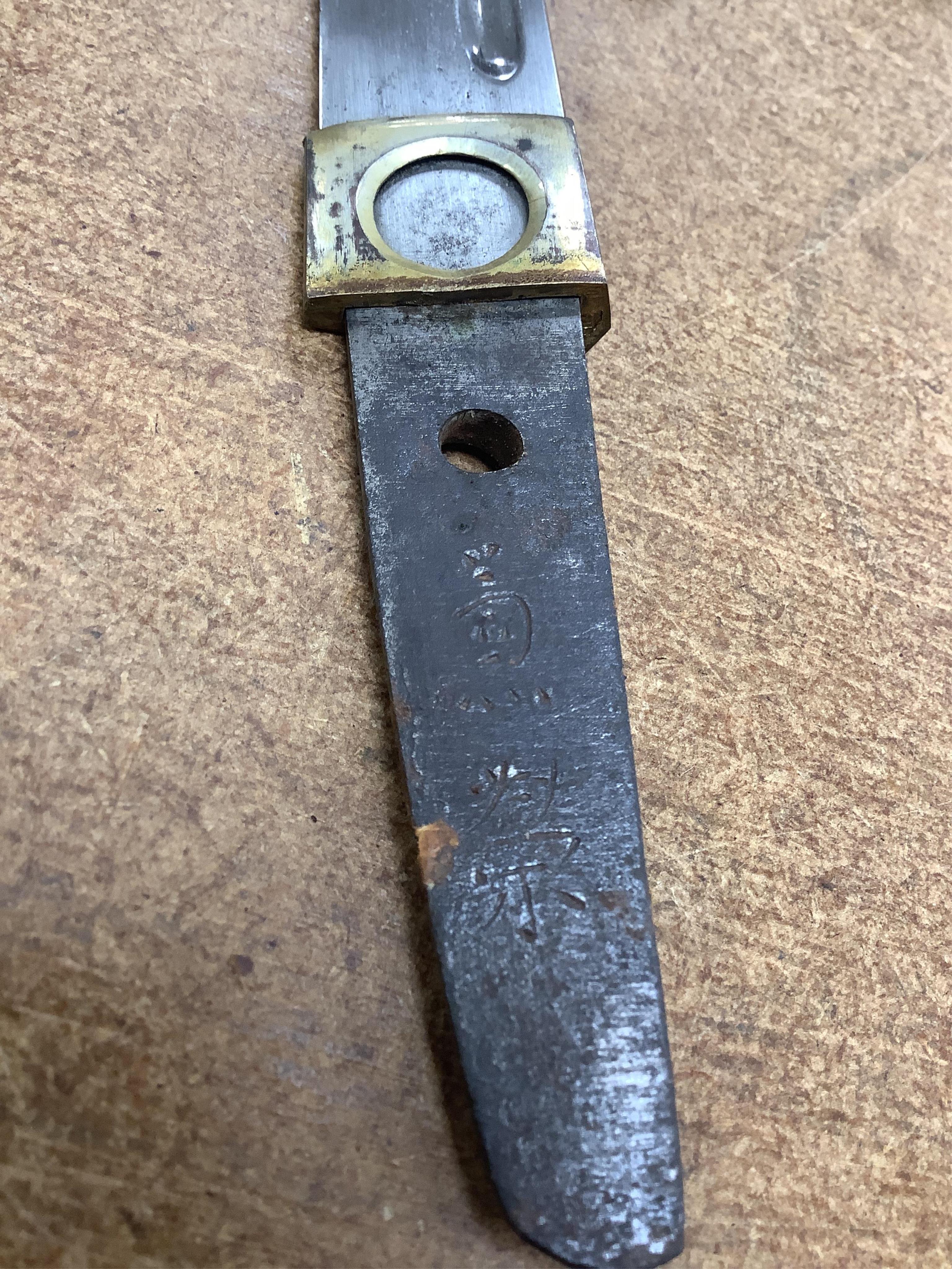 A Japanese knife in lacquered sheath and a handle, largest 34cm in length. Condition - fair to good